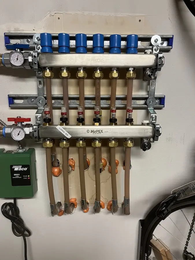 Plumber performing Gas Line Installation at a residential property in Oak Brook